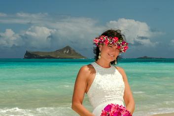 Bride on the beach with flowers