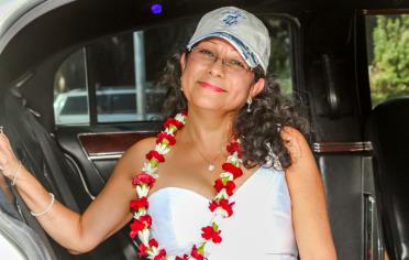 Bride in cap and lei