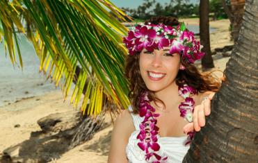 Bride in purple lei and haku head wreath