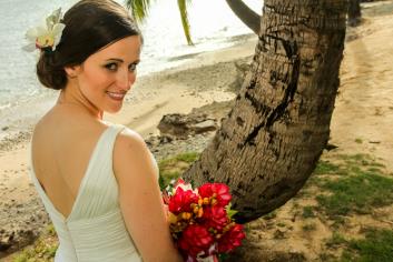 Bride seated looking over her shoulder