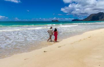 Couple running in the surf